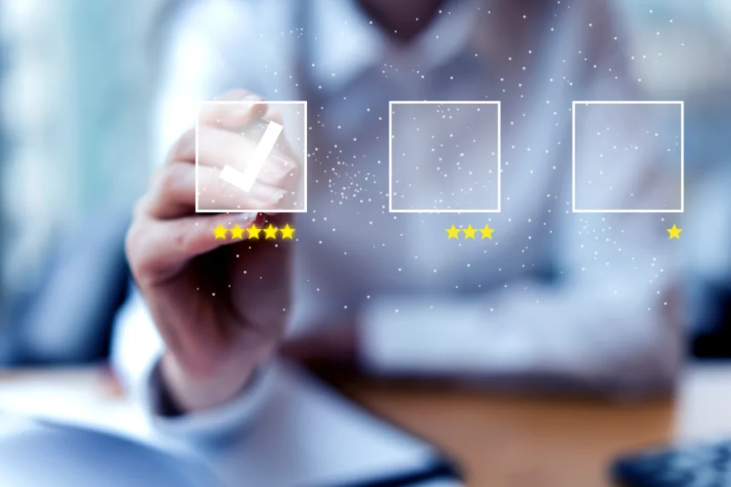 Person giving a five-star rating on a digital interface with a blurred background.